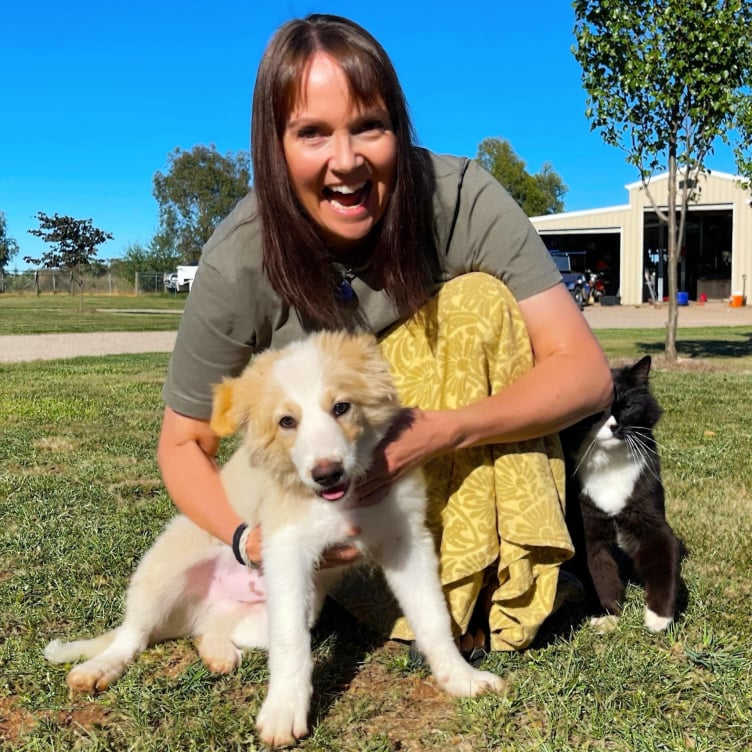 Robyn with her puppy in 2023